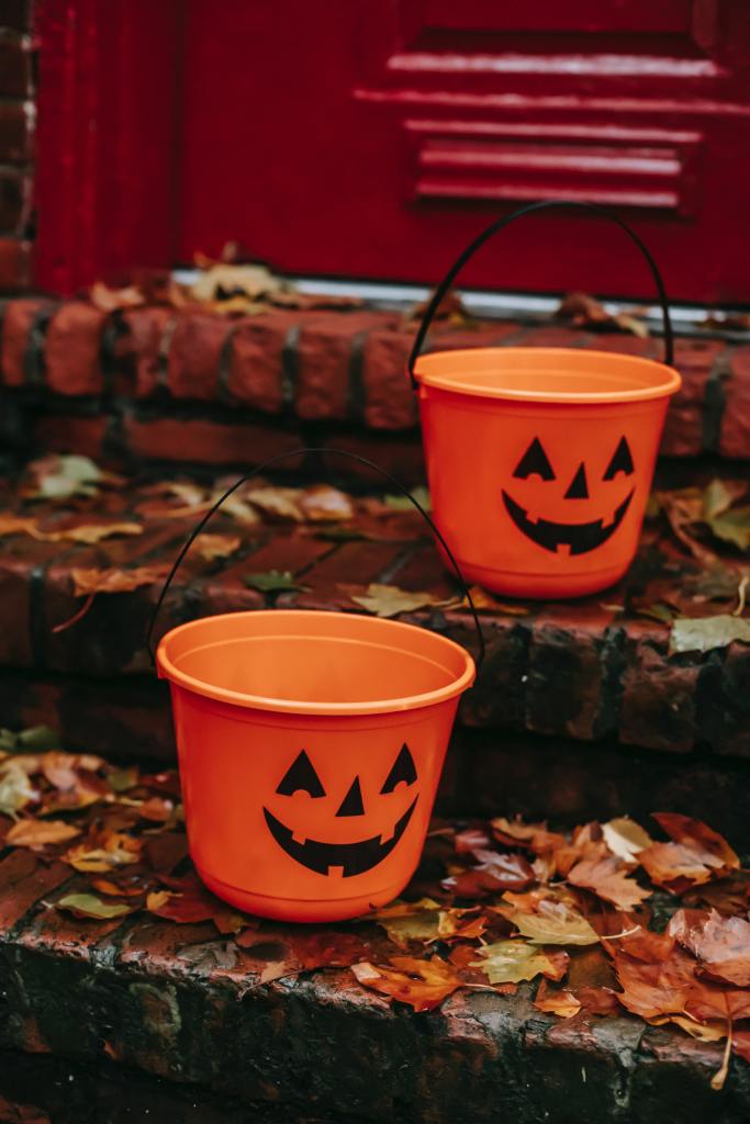 Image of Halloween candy buckets on steps